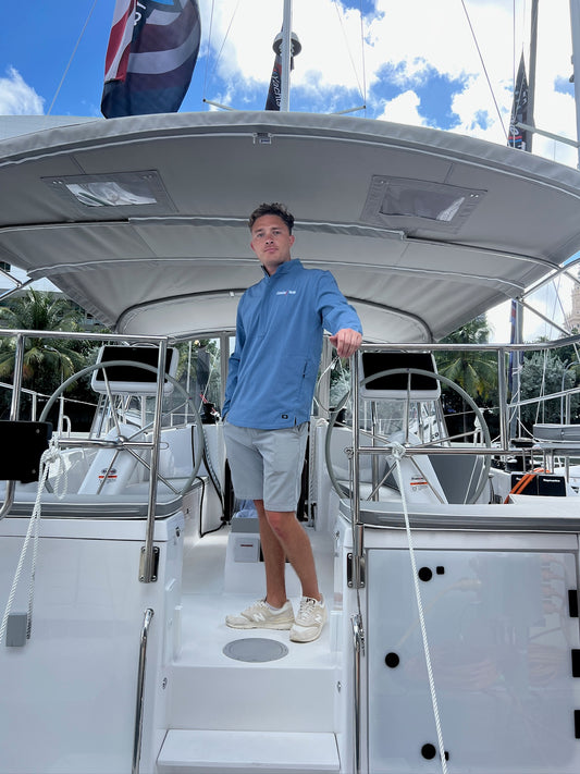 Guy wearing Ogio Half Zip Pullover - Black - Catalina Yachts Logo